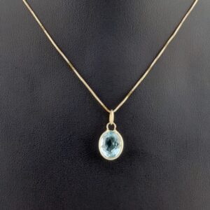 14k Yellow Gold Pendant with a 2.99ct Oval Cut Bezel Set Blue Topaz. 1.1 grams total & 0.5 grams of gold.