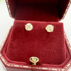Round Diamond Studs Earrings set in 14K Yellow Gold. Approx .85 ct. Total Weight.