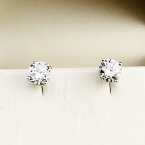 1.6 ct. TW Round Diamond Stud Earrings set in 14K White Gold Standard 4 prong setting with screw back posts. Approx. .80 ct. each. 6.1mm diameter