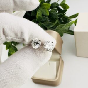 3.84 ct. Diamond Earrings Studs, E color and VS2 Clarity. 3 prong 14K White Gold martini setting. These have very special Protektor Backings on them that lock in to prevent from falling out or getting loose. These diamonds average just over 8mm diameter. 3.66 grams Total Weight. If asked to order these earrings, they would cost more just to make them.