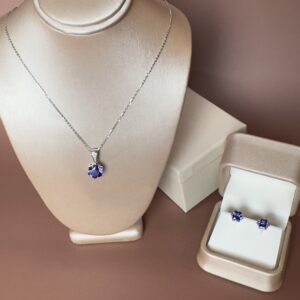 Snowflake Cut Tanzanite and Natural Diamond Pendant Necklace with Cable Chain, 10mm Diameter Stone (3.9 g) and Matching Snowflake Cut Tanzanite Stud Earrings, 8mm Diameter Stones (2.5 g together) all set in 14k White Gold. 6.4 grams Total Weight of matching set.