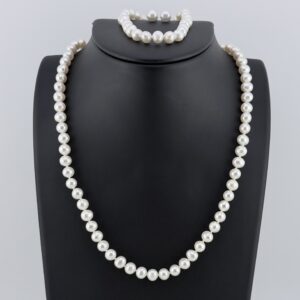 FreshWater Pearl Set with a Neckalce, Bracelet, and Earrings All Marked 925