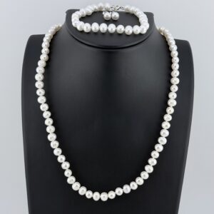 FreshWater Pearl Set with a Neckalce, Bracelet, and Earrings All Marked 925