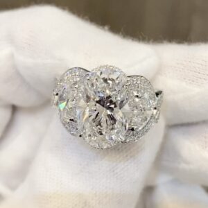 Oval Cut Halo Accent Side Stones